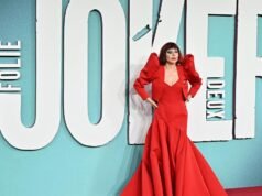 Lady Gaga pauses concert after dancer falls off stage