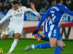 Madrid survive La Liga scare to keep pressure on Barca