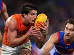 Taylor cramps, but hamstring holds in AFL comeback