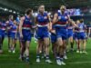 Dogged defender pips Pies with mark of a champion