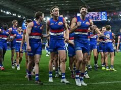 Dogged defender pips Pies with mark of a champion