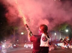 France detains hundreds after Champions League final