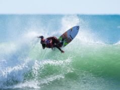 Robinson snaps two boards but survives thrilling heat