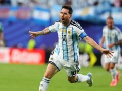 Messi magic gets defending champions going at World Cup