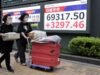 Asia markets temper Iran deal optimism