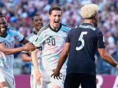 Belgium into QFs after beating last remaining co-hosts