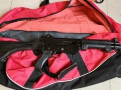 Military-style weapons seized in safe house raid