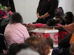 Hundreds gather in pink at Alice Springs funeral for Kumanjayi Little Baby