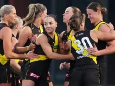 Tigers celebrate old and new with AFLW win over Magpies