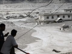 Urgent search for Australians missing in flash floods