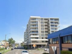 A woman has died after falling from an apartment balcony in Wollongong