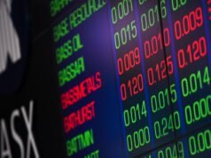 Aussie shares flat as health stocks, BHP limit losses