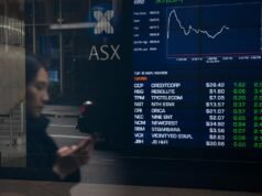 Aussie shares dip as banks and retail stocks drag
