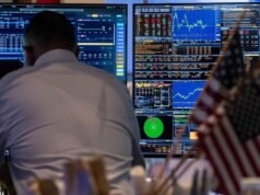 Wall St slips as investors weigh data, Iran tensions