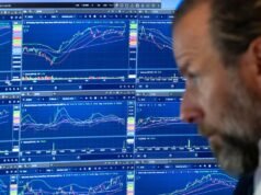 Wall St dips as investors monitor Iran talks, earnings