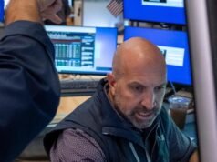 Wall Street ends mixed as optimism on AI shares returns