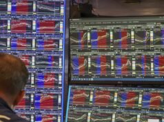 Wall Street ends lower following hot inflation data