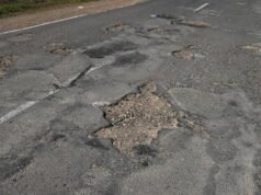 Labor pitches pothole website, inmate roads clean-up