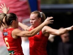 Suns surge to victory, Tigers survive Giant AFLW scare