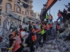 Bombed-out Gaza building collapses, killing 12 people