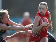 Suns cop spray en route to scrappy AFLW win over Port