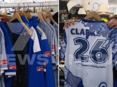 Alastair Clarkson spotted making huge Vinnies donation with bags of Kangaroos apparel