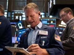 Wall Street ends lower as oil passes $US100 per barrel