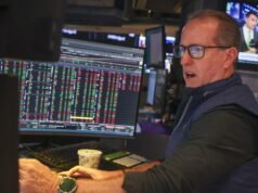 Wall St ends lower on higher yields, rising oil prices