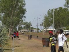 Man rescued, police cars damaged in community unrest