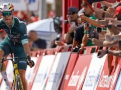Van Aert wins Vuelta stage amid scorching heat in Spain