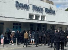 Masked men block roads in UK port ‘stop the boats’ demo