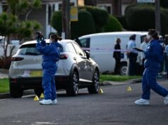 Woman charged over botched gangland execution