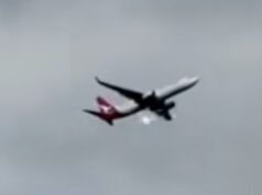 Qantas flight from Queenstown to Sydney diverted to Christchurch after engine flames seen