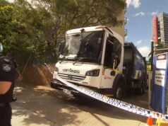 Body found in bin outside apartment complex in Kangaroo Point, Brisbane