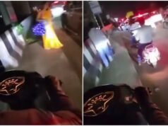 Man rides scooter on footpath to bypass traffic jam, pedestrians forced to make way