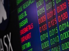 Australian shares finish flat as rate increase looms