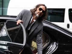 Russell Brand at court for hearing before rape trial