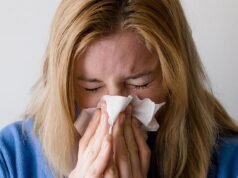 Flu season in West Australia: School holiday warning as prolonged season linked to travel and AFL Grand Final