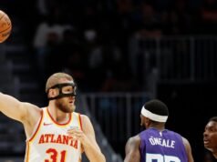 Daniels steals spotlight, masked teammate shines in NBA