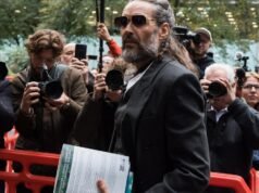 Russell Brand prays before court