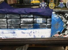 Trio charged after 120kg of cocaine found in cabinets