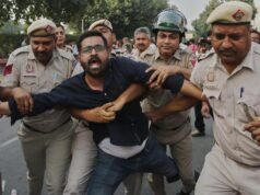 India detains thousands of protesters, locks down Delhi