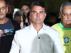Flavio Bolsonaro in US first claims to be Brazil’s president-elect, then its leader